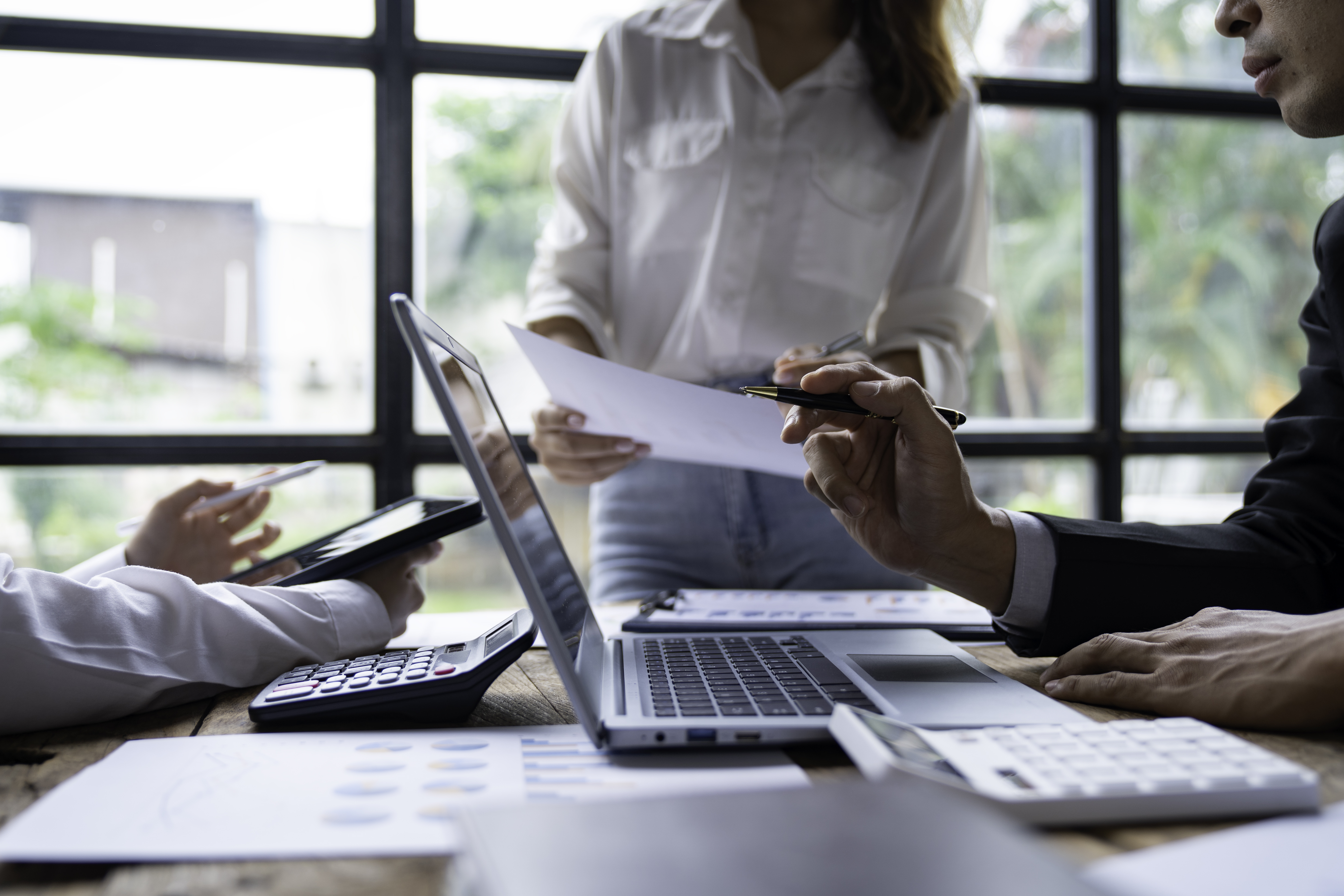 Business people meeting in the office to discuss prepaid expense management